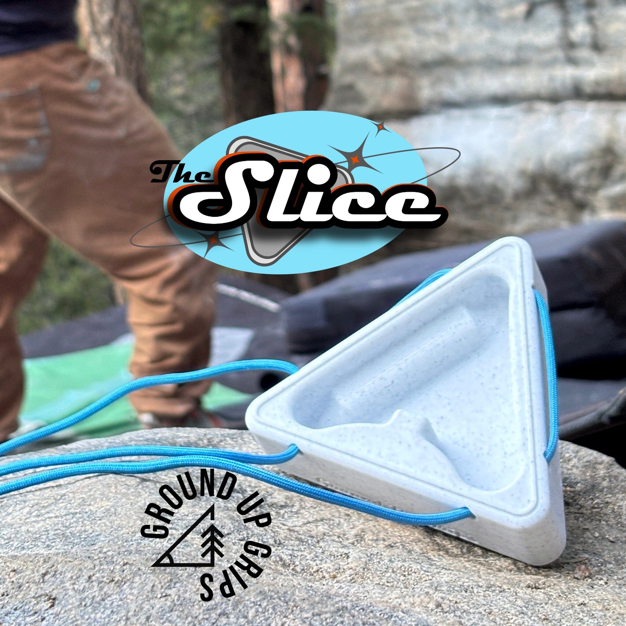 A triangular warm up block for climbing, branded with The Slice and Ground Up Grips logos.